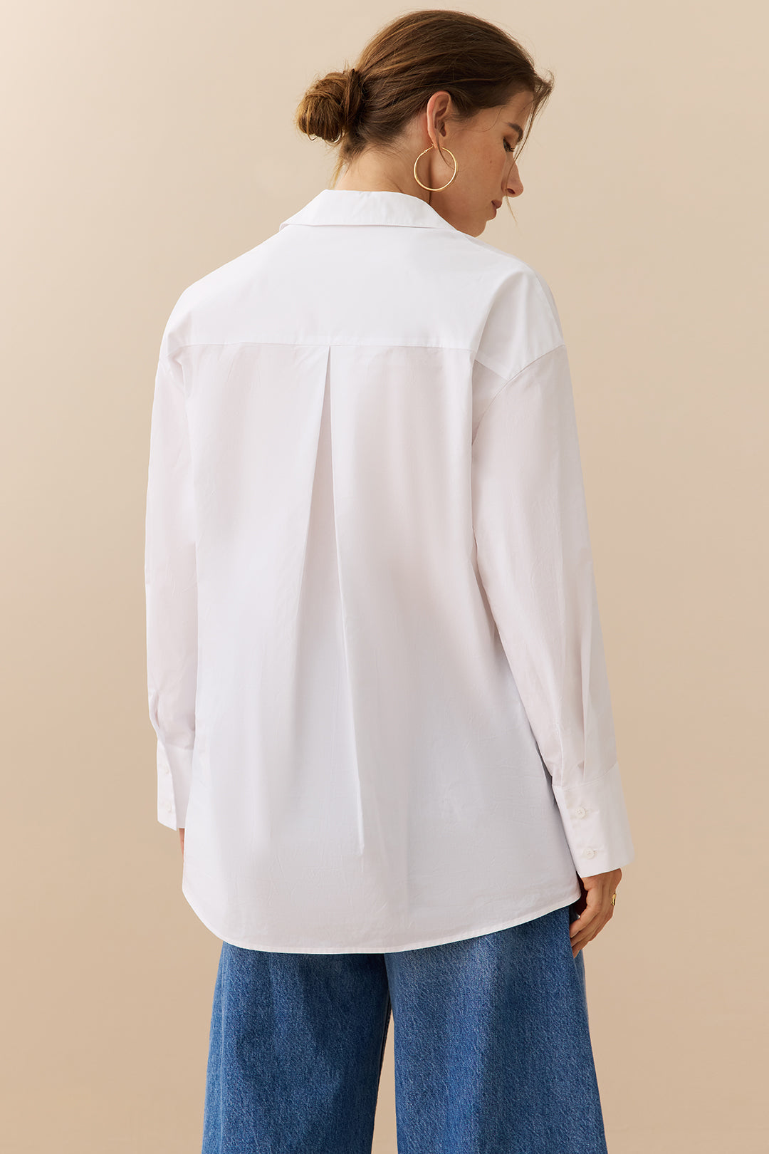 Camisa de manga larga con botones lisos